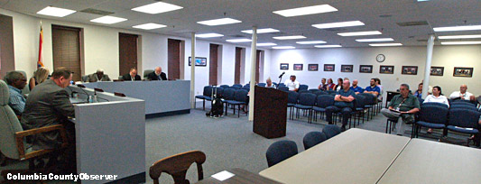 Lake City Council Chambers with City Council, a couple of members of the public, and city staffers