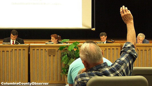 Columbia County resident and Navy veteran Sammy Dunn sat for 37 minutes with his hand in the air before a County Commission Chairman acknowledged he was alive.