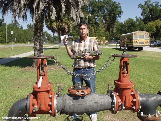 Dan Houston in front of Fort Whie public school