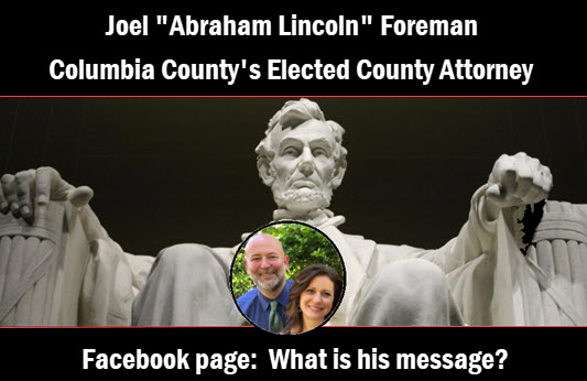 Columbia County Attorney Joel Foreman's Facebook page where he is in a circle in front of Abraham Lincoln. The copy reads: What was he thinking?