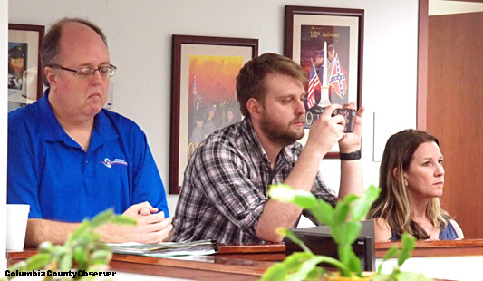 The County's mainstream print media reporter, Carl McKinney, squeezed in between Emergency Management Director Shayne Morgan and United Way's Jennifer Anchors. The Lake City Reporter was also not concerned about social distancing. Reporter McKinney's photos, which would have shown the County's lack of concern for social distancing, did not appear in print.