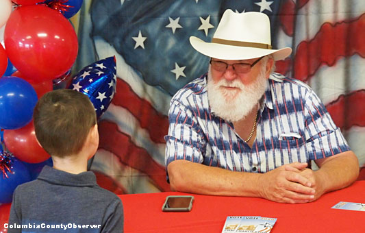 Charlie Keith speaks with a future voter.