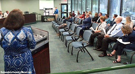 Renae Allen and FGC staff and visitors listened to the presentations.