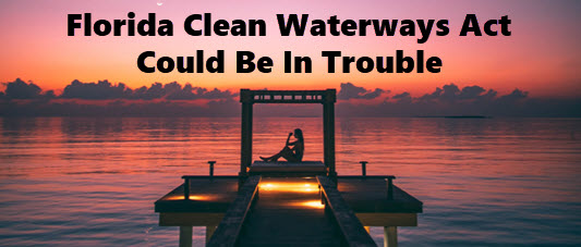 Photo of woman relaxing on dock on inland waterway