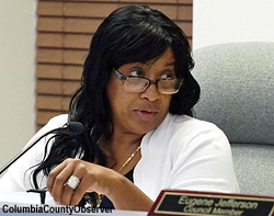 Interim City Manager Ami Fields listens