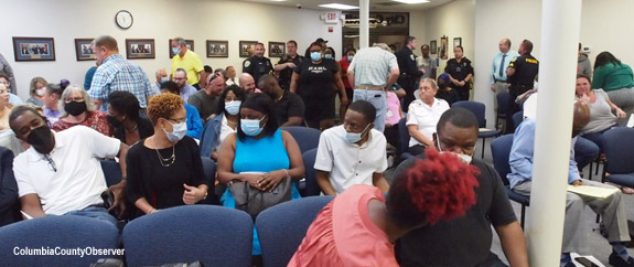 Lake City City Council Chambers filled up to over capacity.