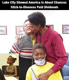 Befaithful Coker at the meeting's conclusion, with daughter Victoria and son Michael.