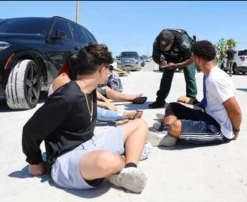 Lee Sheriff's Office deputy arresting looters