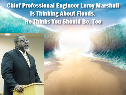 Chief Engineer Leroy Marshall lookina at high water, with headline: Chief Professional Engineer Leroy Marshall is thinking about floods.