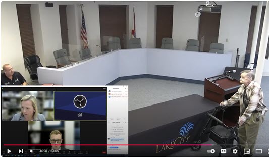The first showing of the police barrier in Lake City City hall.