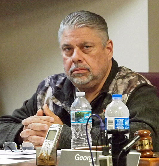 Dennis Rivera at his seat at the beginning of the speical meeting.