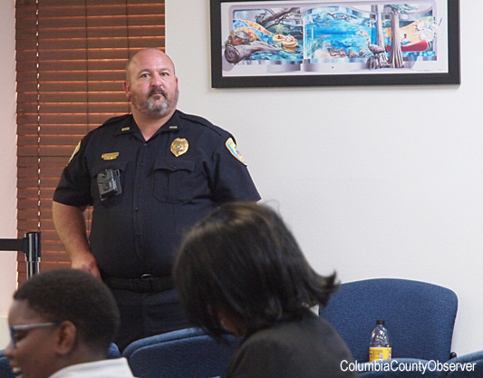 Lt. Register guards the right flank of the City Council.